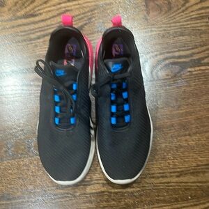 Black and pink Nike Air shoes. Great condition. Barely worn